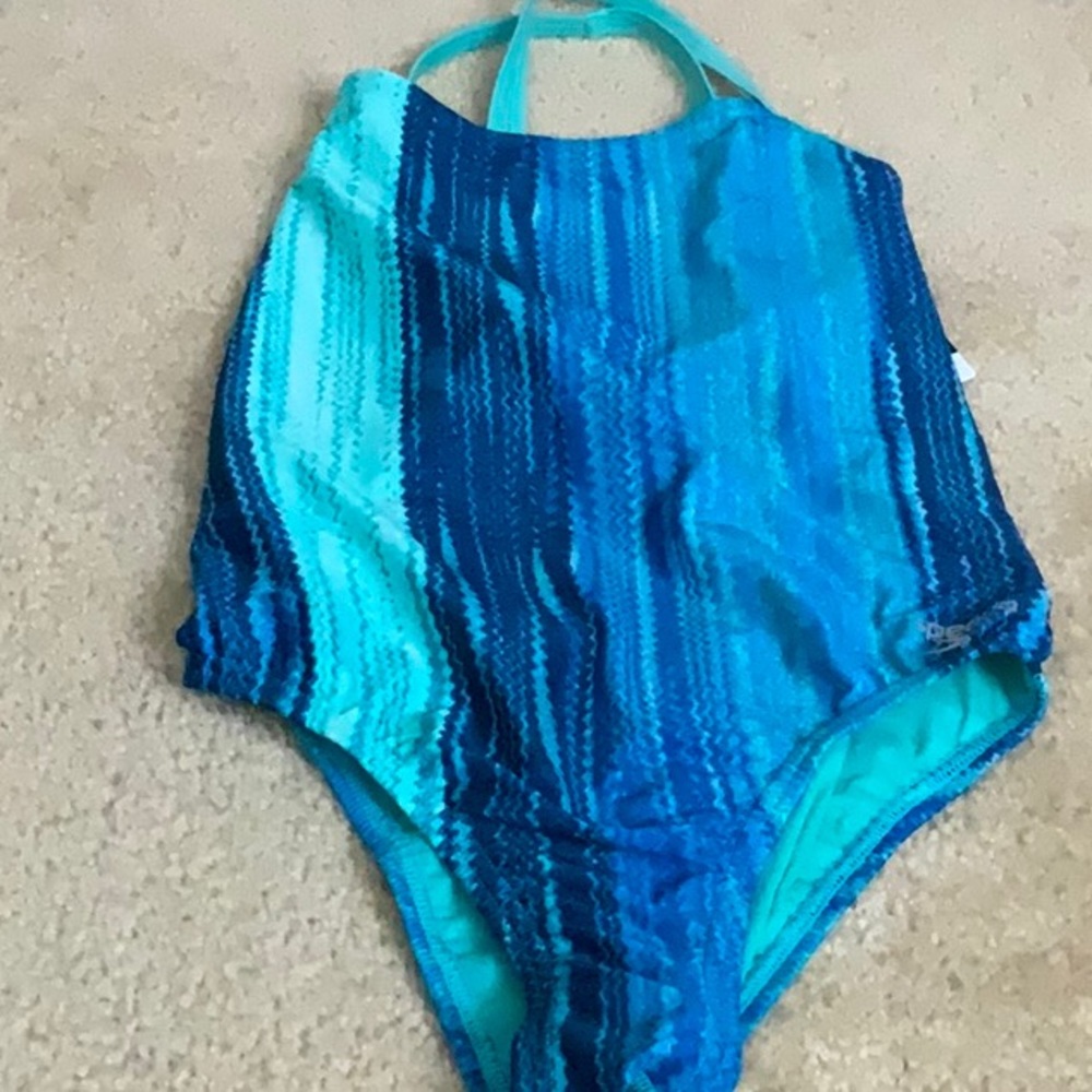 Speedo bathing suit, beautiful blue’s size 30 and brand new with tags!